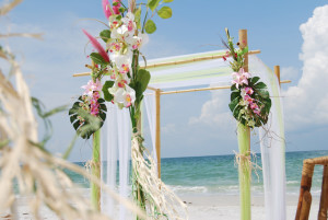 a beautiful four post altar for a beach wedding on st pete beach, beach wedding, florida beach wedding