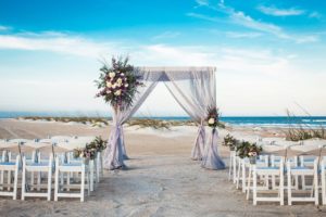 a beach wedding ceremony set up by tide the knot in st petersburg fl, beach wedding, florida beach wedding