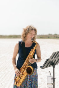 Live musician playing the saxophone